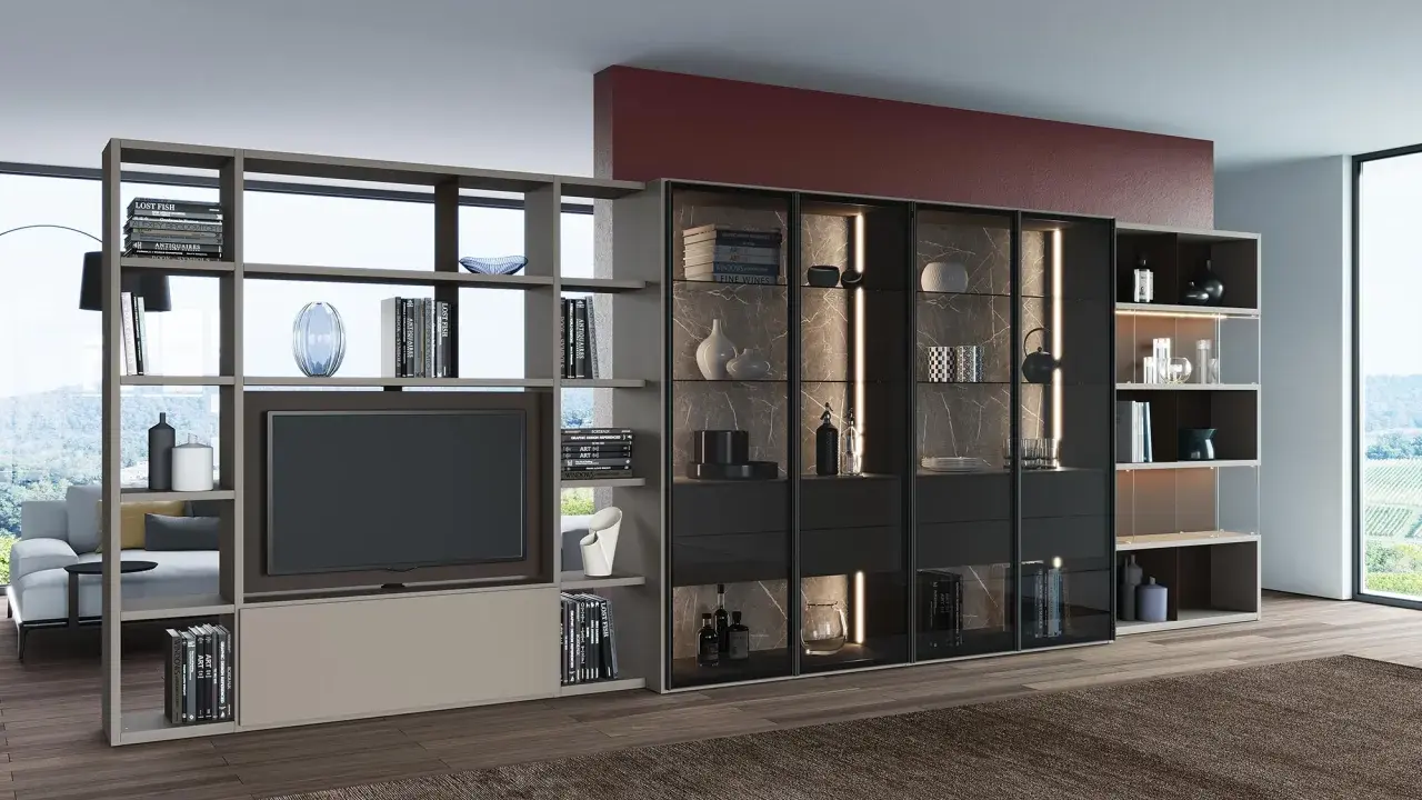 Elegante porta tv girevole design, con libreria componibile e vetrine illuminate, perfetta per un salotto moderno.