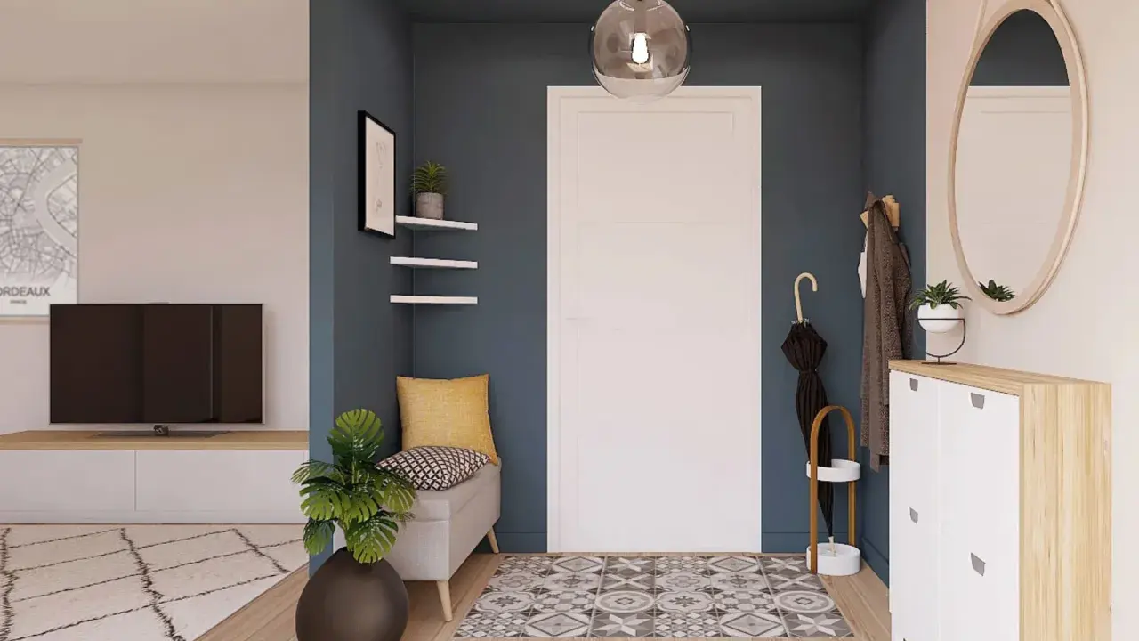 Ingresso moderno con panca, specchio rotondo e scarpiera. Idee particolari per un'accoglienza funzionale e di stile.