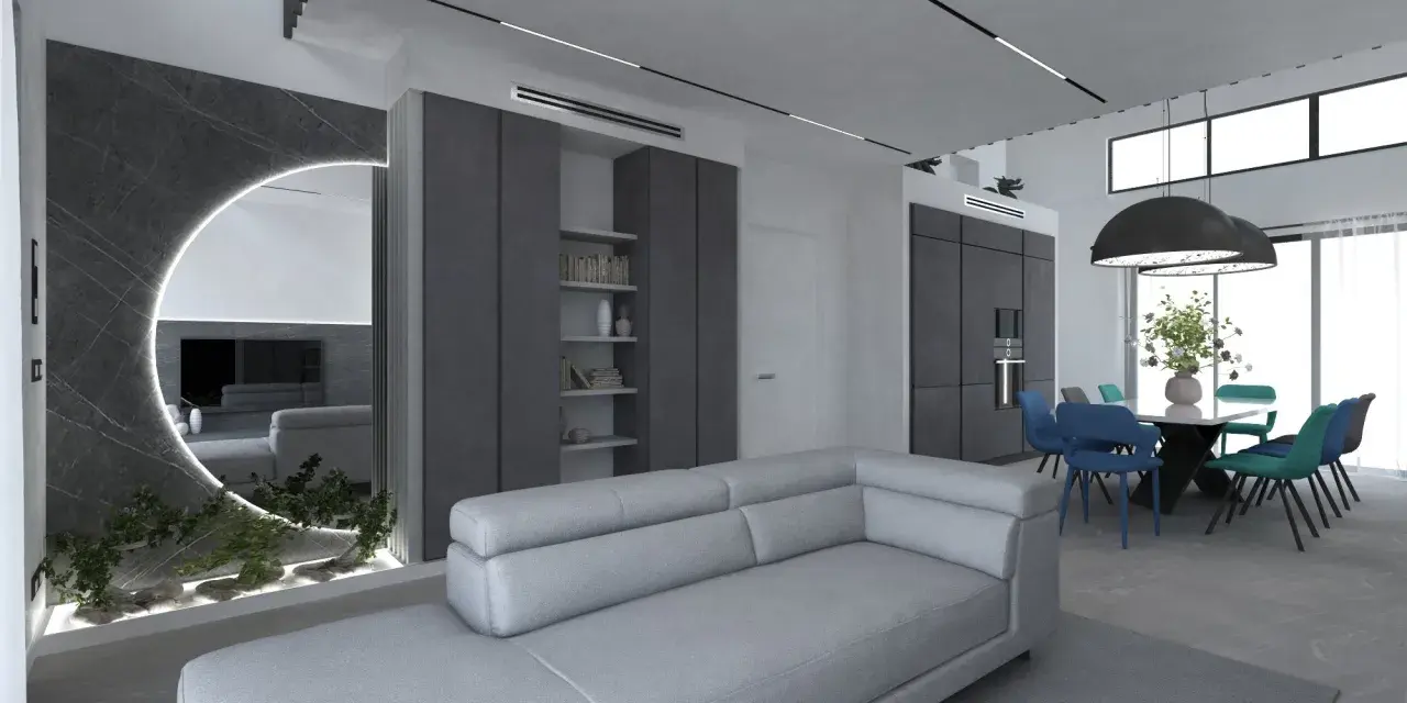 Elegante salotto grigio e bianco con divano moderno, zona pranzo con sedie colorate e un'originale parete a specchio con illuminazione.