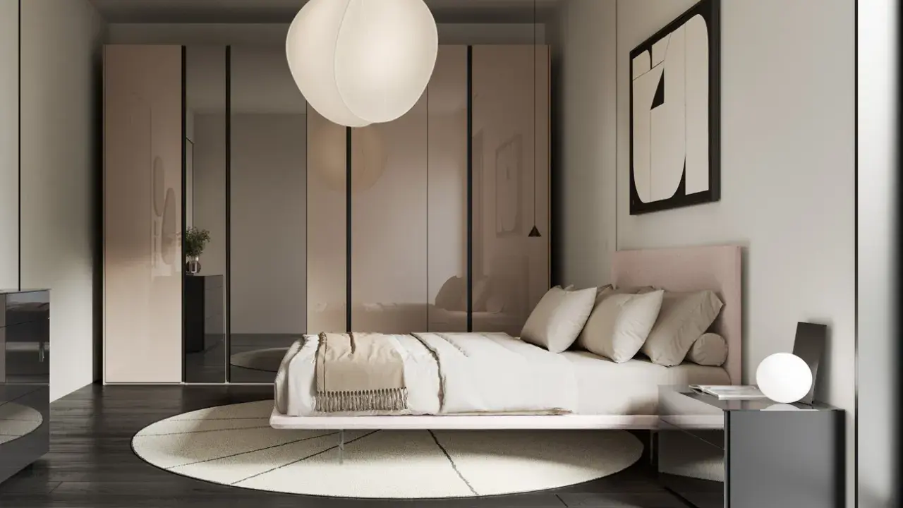 Idee per appartamenti moderni: camera da letto elegante con letto rosa, armadio a specchio e lampada a sospensione sferica.