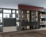 Elegante porta tv girevole design, con libreria componibile e vetrine illuminate, perfetta per un salotto moderno.