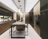 Cucina moderna Valcucine SPA con isola centrale in marmo, pensili neri lucidi e finiture in bronzo.