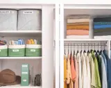 Closet with organized shelves: labeled bins for scarves, gloves, hats, jewelry, bandanas, belts, stacked sweaters, and hanging clothes.