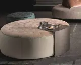 Pouf rotondo imbottito con piano integrato, ideale per ogni altezza pouf.