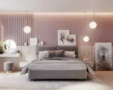 Elegante camera da letto rosa antico e grigio con letto imbottito, specchio rotondo illuminato e opere d'arte astratte.