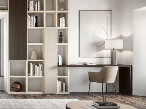 Libreria componibile che permette di ricavare angolo studio in soggiorno, con scrivania integrata e sedia.