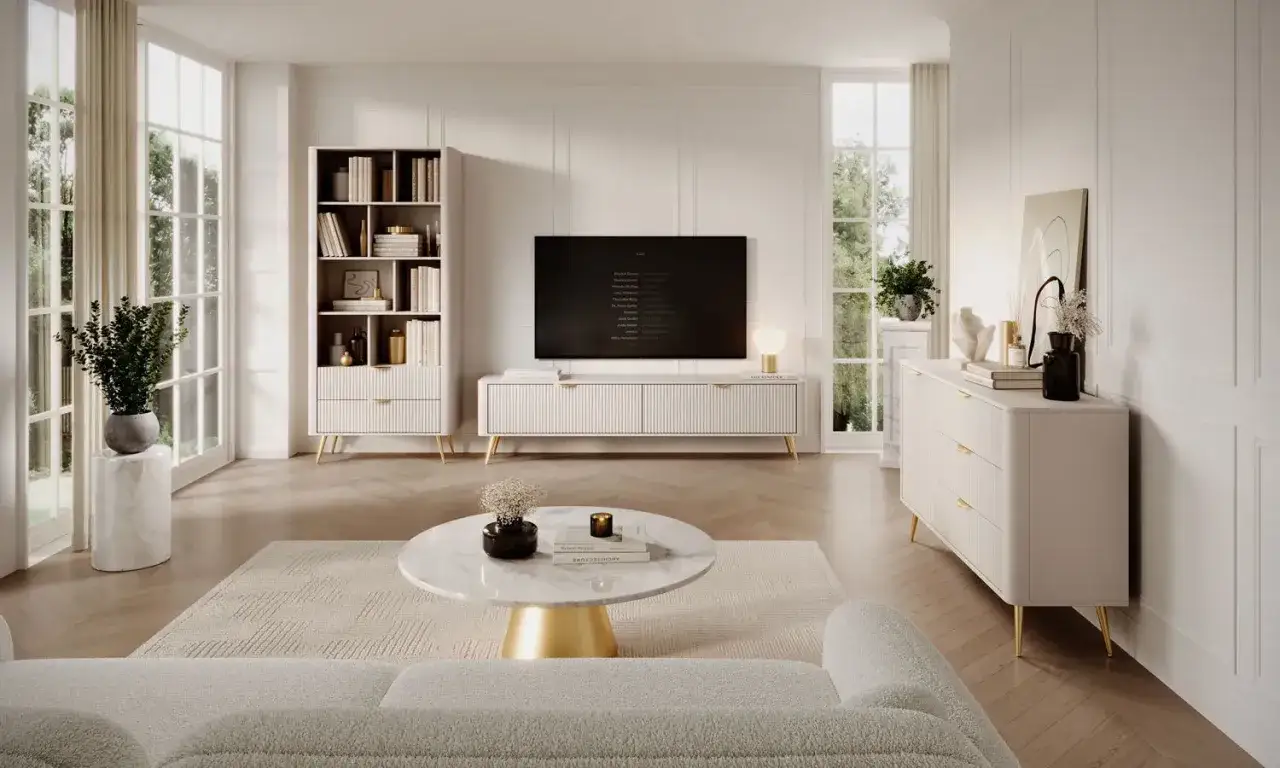 Luminoso soggiorno beige e bianco con mobili moderni, libreria, mobile TV, cassettiera e tavolino rotondo.