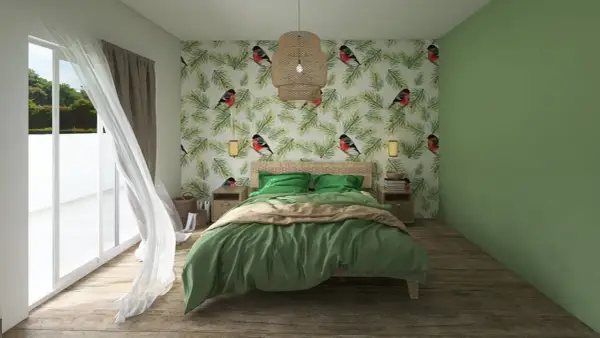 Camera da letto con carta da parati a tema uccelli e pini, biancheria da letto verde smeraldo e una parete verde salvia. Idee camera da letto verde ispirate alla natura.